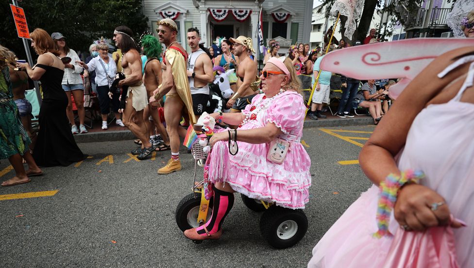 A parade proceeds along Commercial Street during the 44th Annual Provincetown Carnival Parade in Provincetown, Massachusetts, US, on 18 August 2022