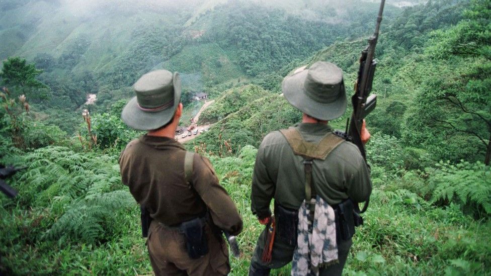 Two armed rebels from the Revolutionary Armed Forces of Colombia (Farc) in 1998