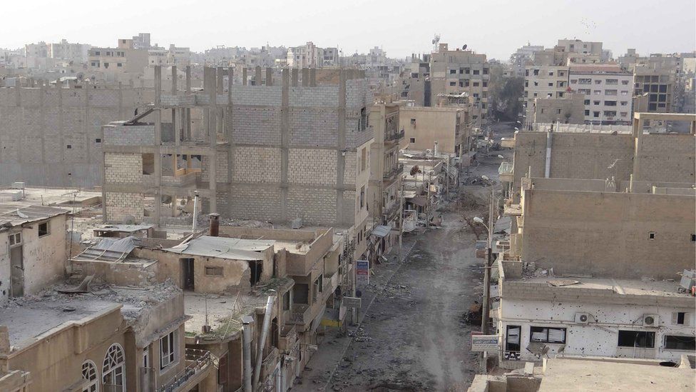 Shattered buildings in Deir al-Zour, January 2013