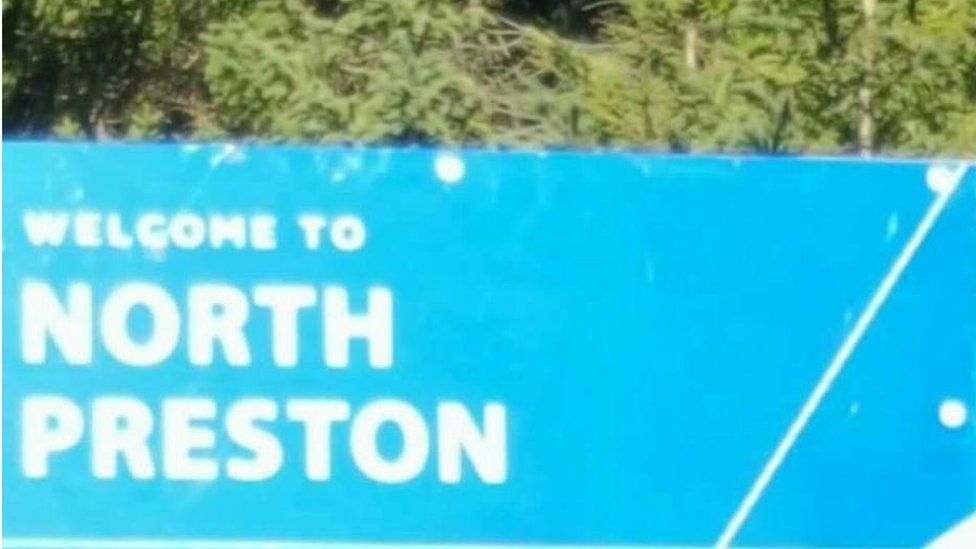 A roadside sign welcoming people to the community of North Preston