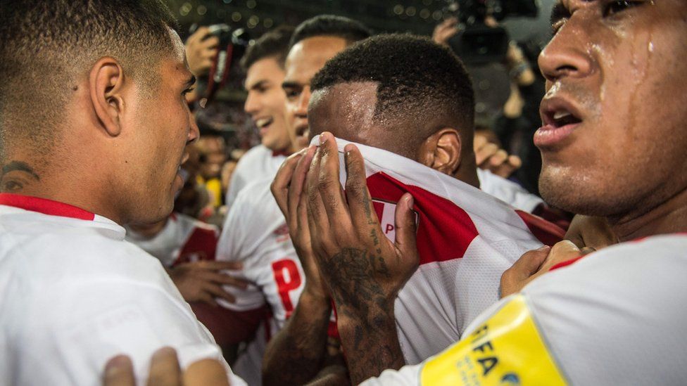 Goalscorer Jefferson Farfan (C) was overcome with emotion after the match ended