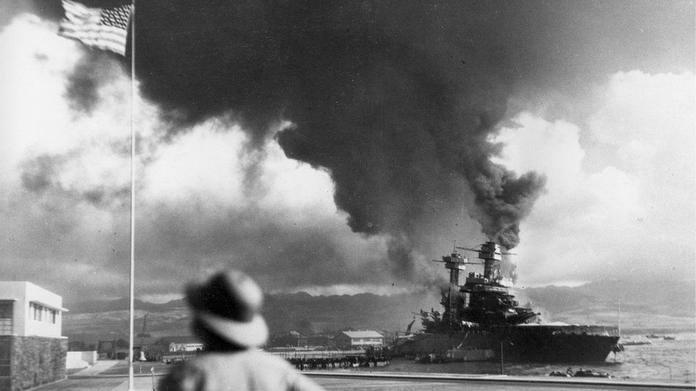 American ships burn during the Japanese attack on Pearl Harbor, Hawaii, in this file photo