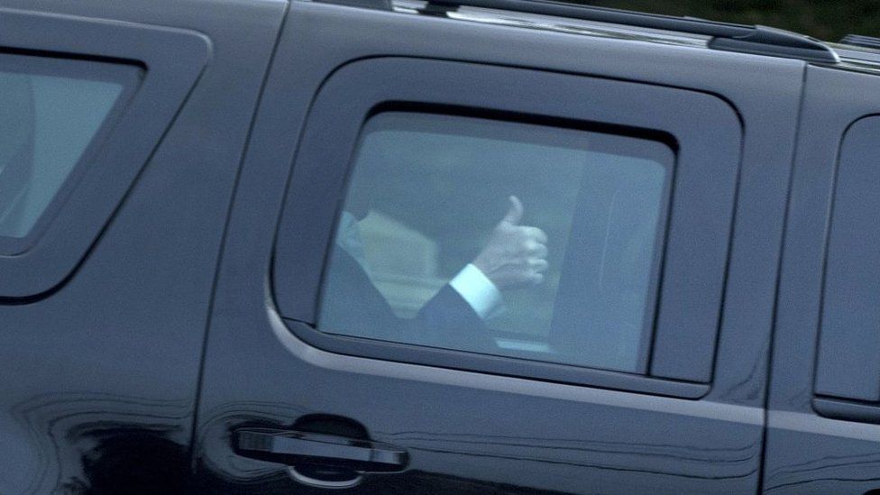 US President Donald Trump gives a thumbs up while departing the Trump National Golf Club after spending a long weekend at the club on May 7, 2017 in Bedminster, New Jersey