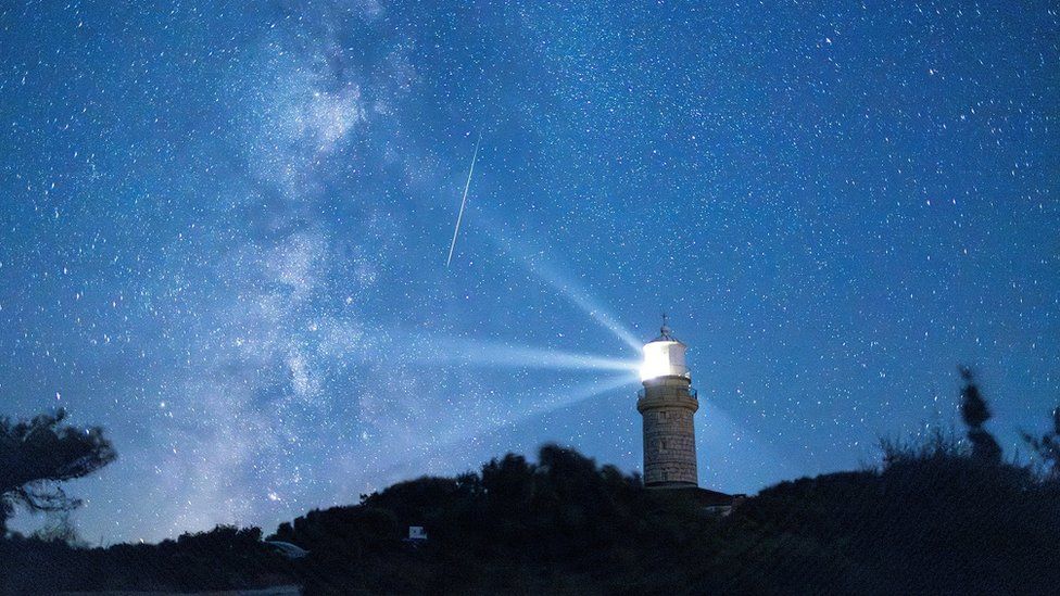 A meteor streaks in the night sky during the annual Perseid meteor shower on the island of Lastovo, Croatia