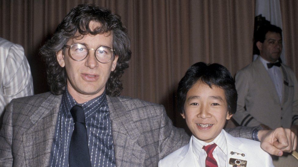 Steven Spielberg and Ke Huy Quan in 1985