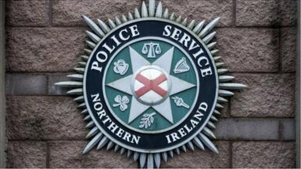 A PSNI badge