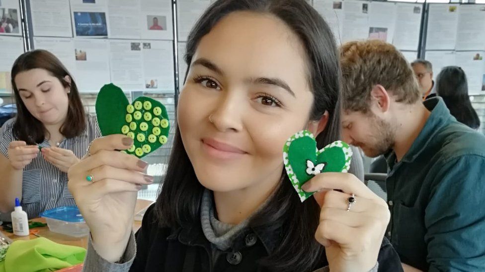 Leila Bousbaa with some green hearts
