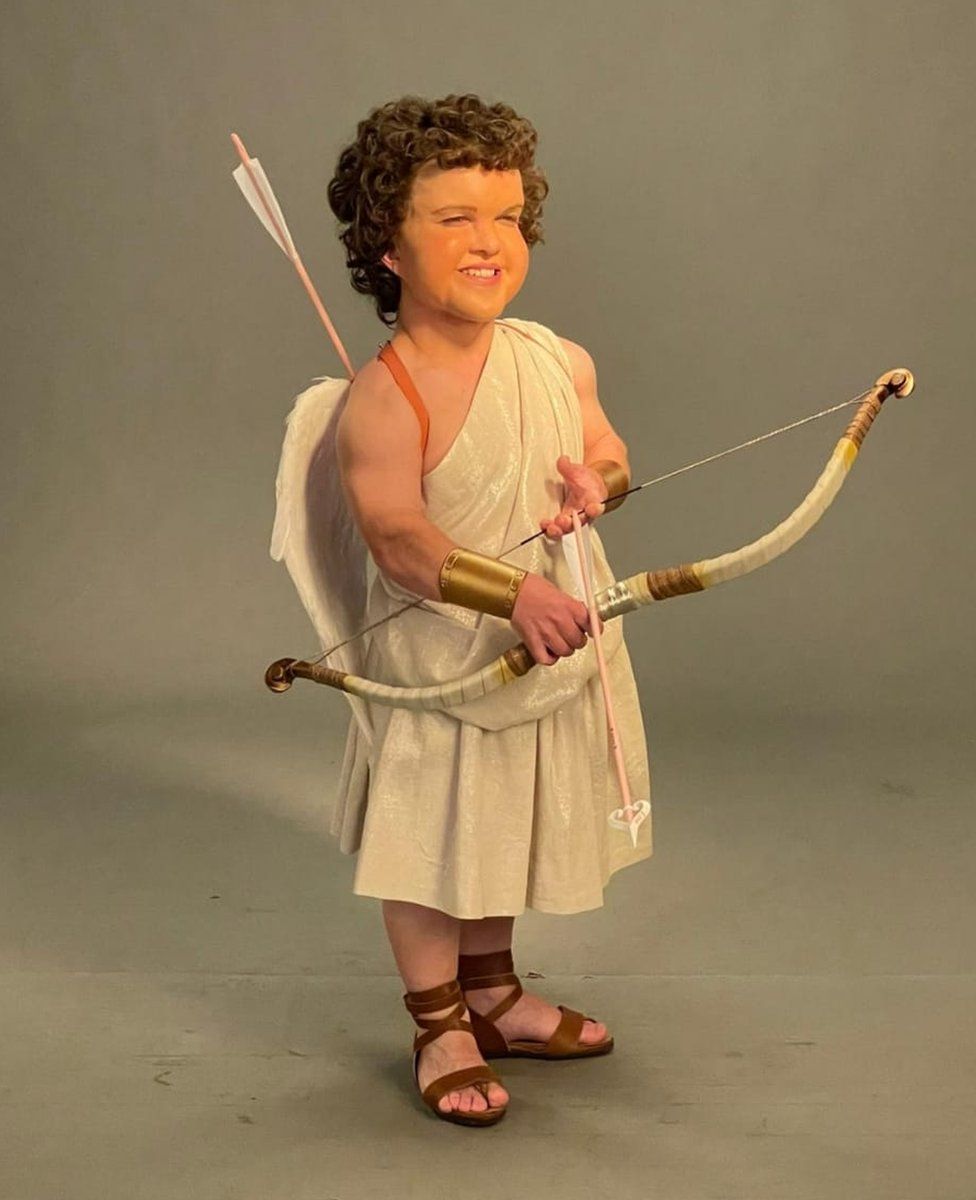 George dressed as Sweet Cupid in fantasy film The School for Good and Evil