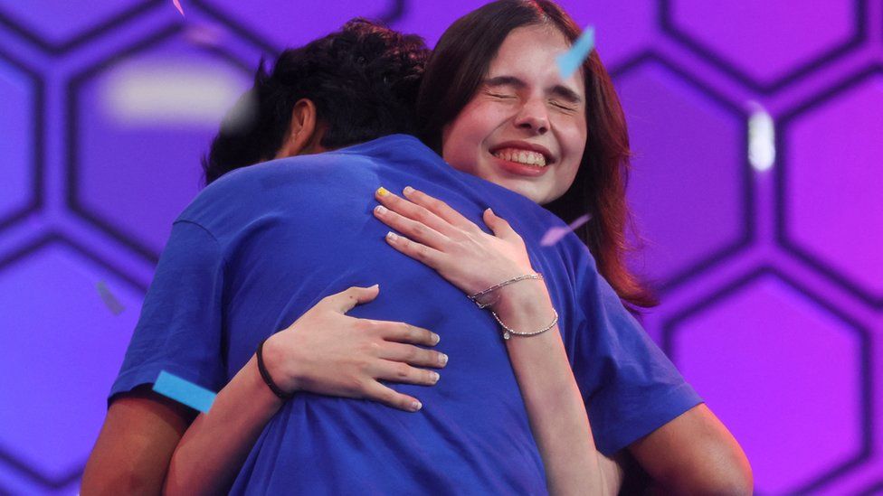 Charlotte Walsh gives Dev Shah a congratulatory hug after he won the Scripps National Spelling Bee