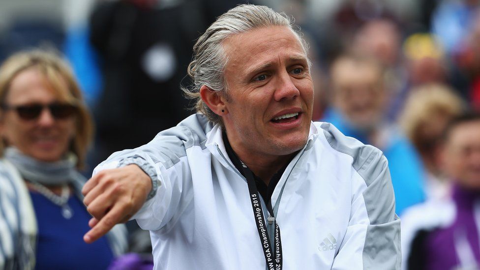 Former Footballer Jimmy Bullard gestures during the Pro-Am ahead of the BMW PGA Championship at Wentworth on May 20, 2015 in Virginia Water, England.