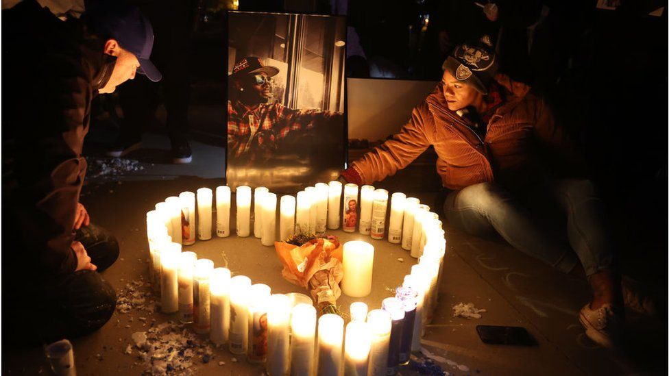 Candlelit vigil at a skate park