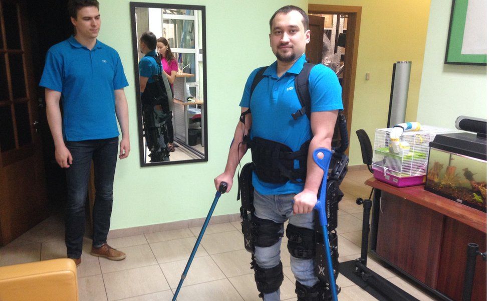 A paralysed man wearing an ExoAtlet exoskeleton