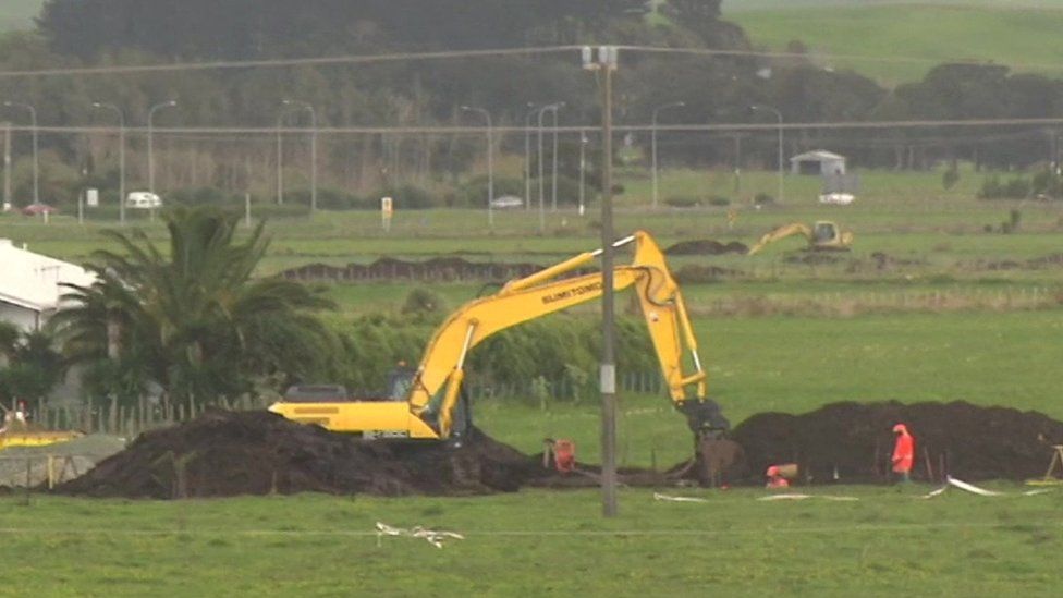 Image shows a digger at the site of the burst pipeline in Ruakaka
