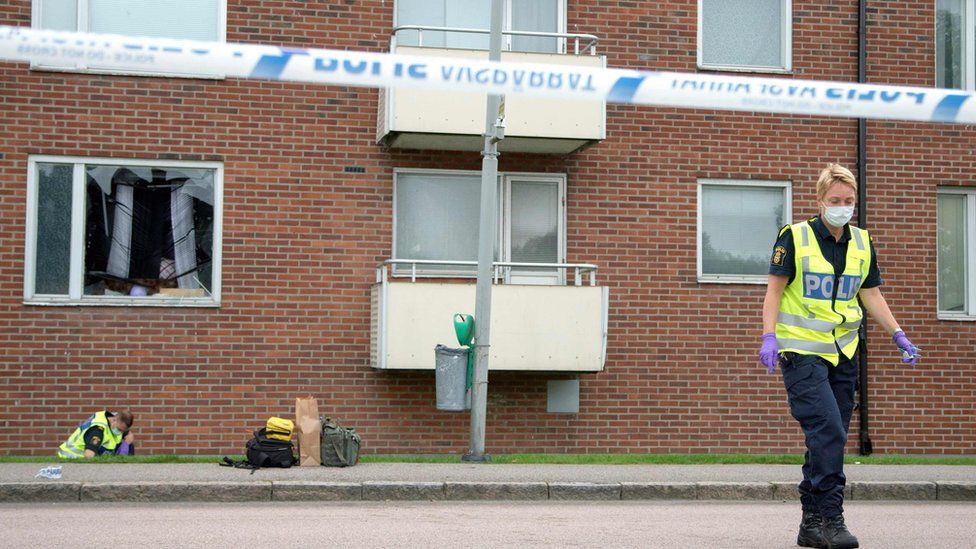 Forensic police outside the flat in the Biskopsgarten area of Gothenburg