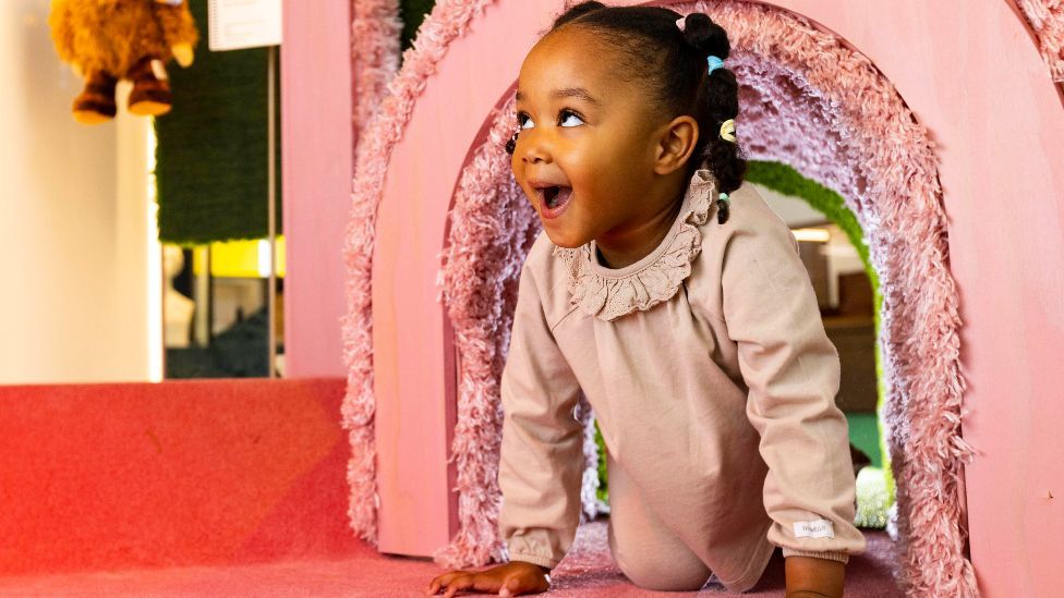 A child pictured in the Manchester Museum