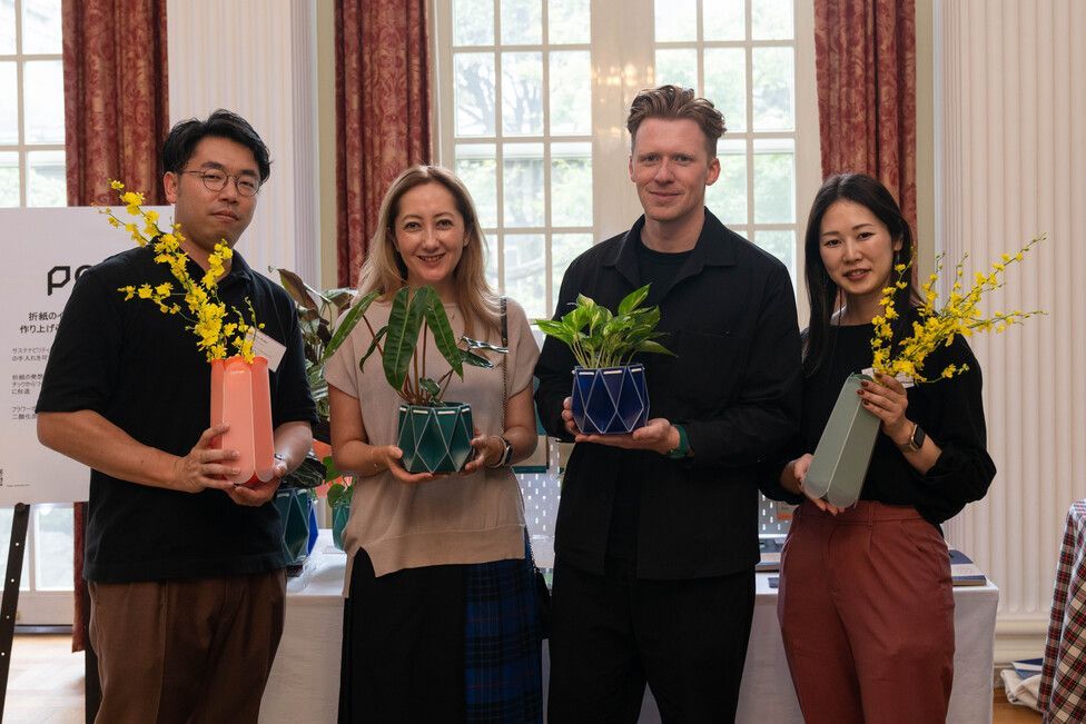 Andrew Flynn (middle right) at a design showcase in Japan