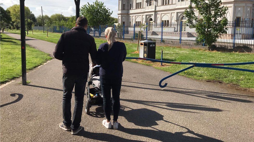 Two people with a pram in by Ford End Road, Bedford