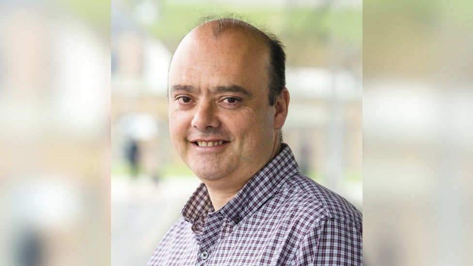 A headshot of Professor Dudley Shallcross