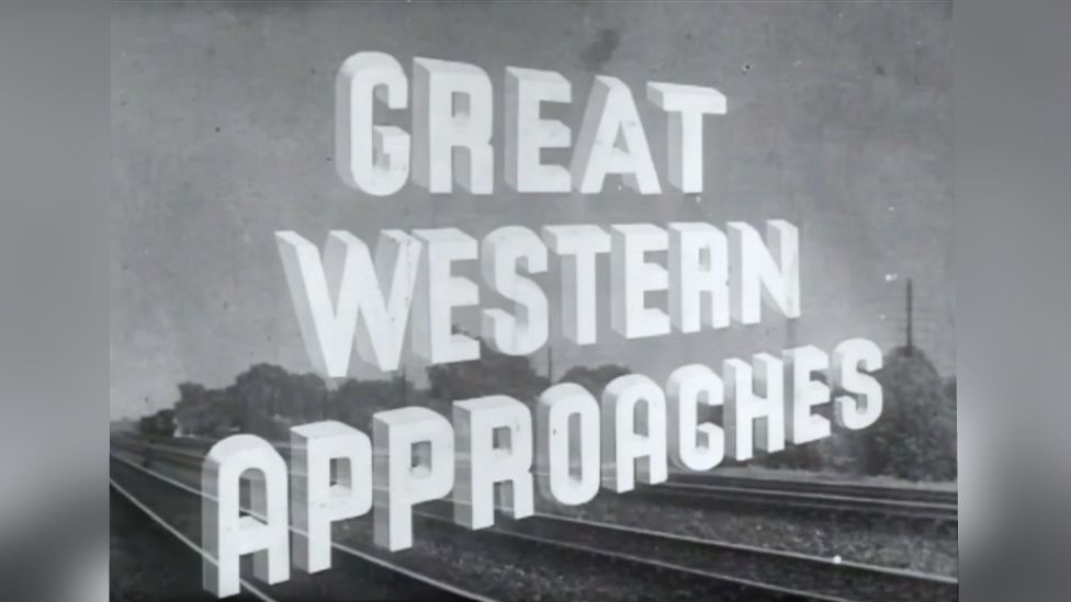 Title card for Great Western Approaches. It is black and white, with white capital letters spelling out the title. A railway line can be seen in the background