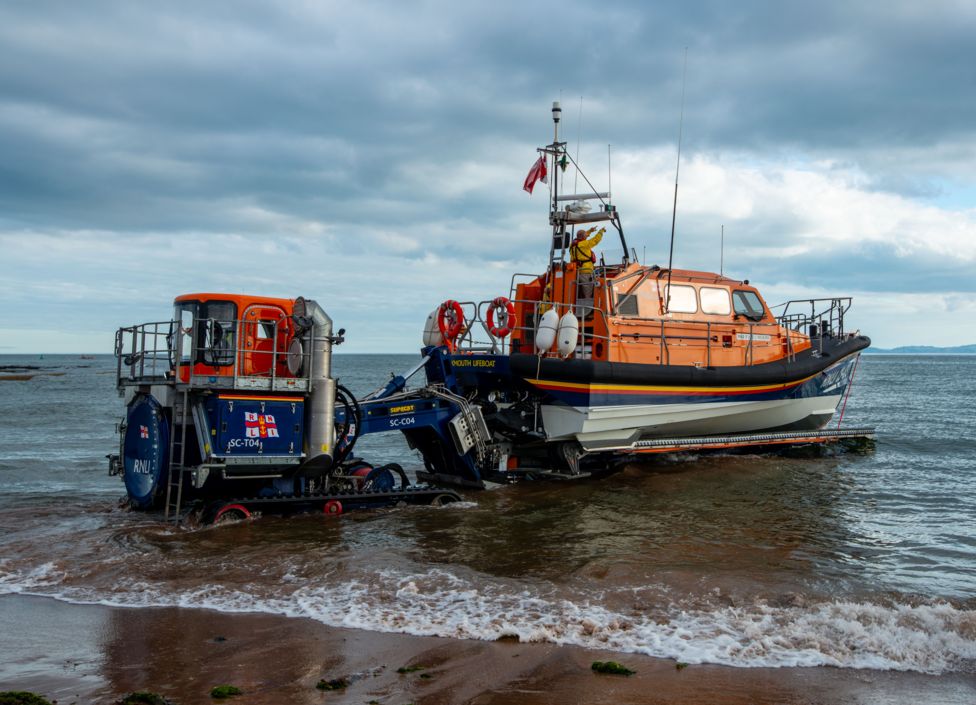 Exmouth l﻿ifeboat tows damaged yacht to safety BBC News