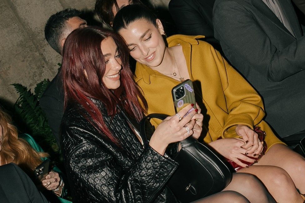 Dua Lipa and Rina Lipa at Gucci Cruise 2025 Fashion Show held at the Tate Modern on May 13, 2024 in London, United Kingdom