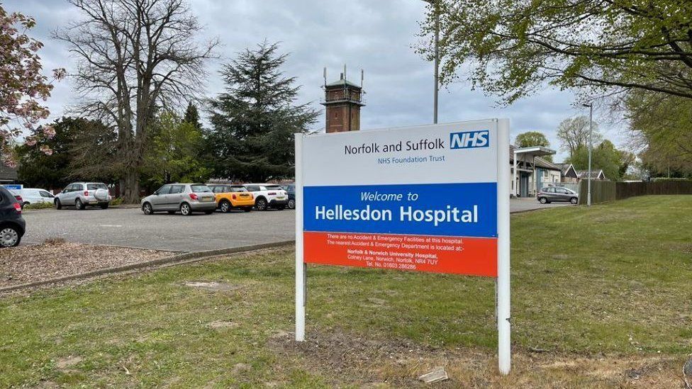 Outside Hellesdon Hospital with welcome sign