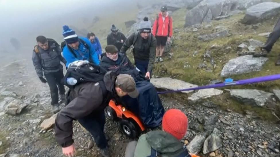 Ian Flatt scaling Snowdon with family and friends by his side
