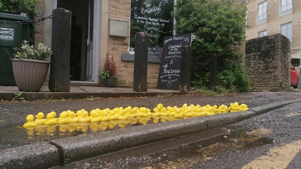 Rubber ducks outside Dean Majors' business