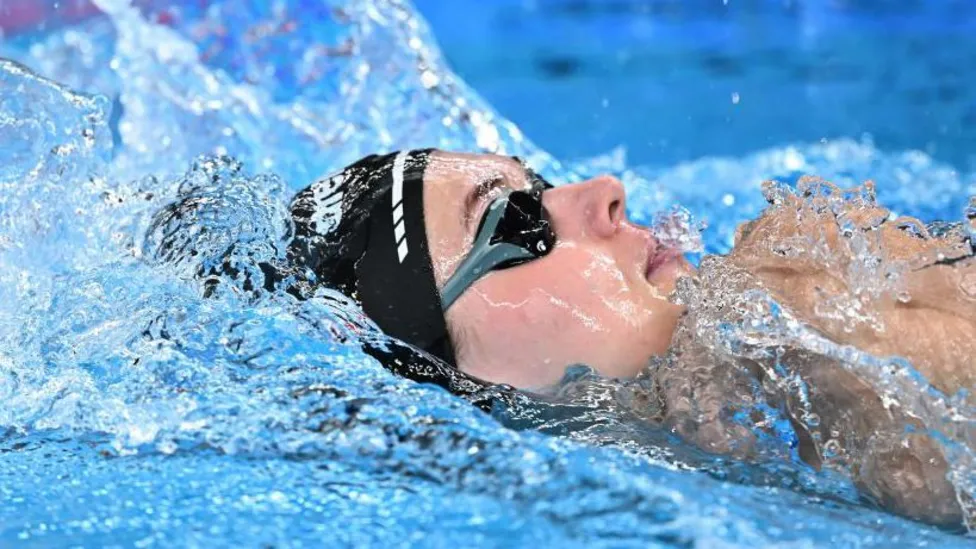 Exhaustion Overcomes Slovakian Swimmer Potocka in Thrilling Heat Collapse.