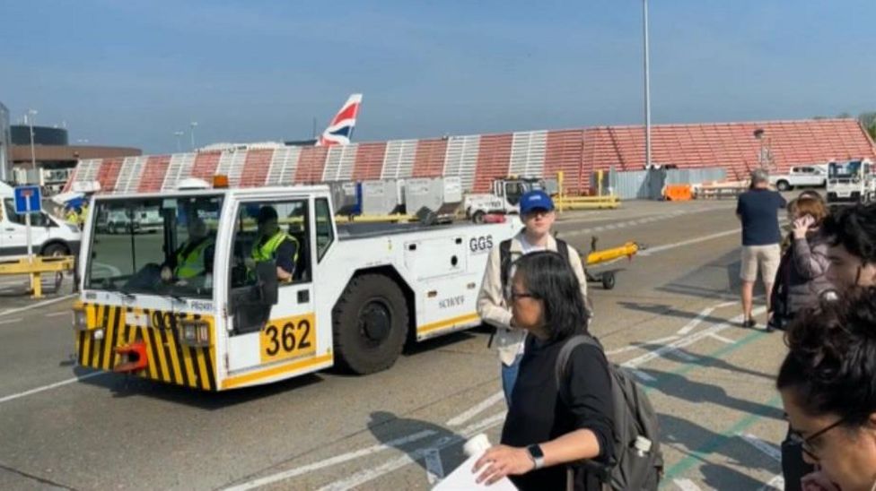 Gatwick Airport South Terminal evacuated after fire alarm - BBC News