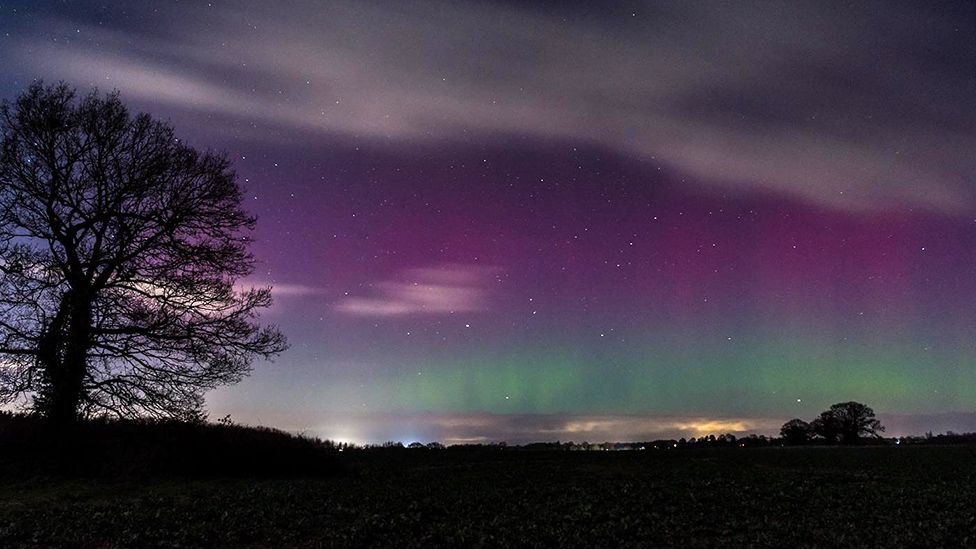 Northern lights over the countryside at Poringland in Norfolk
