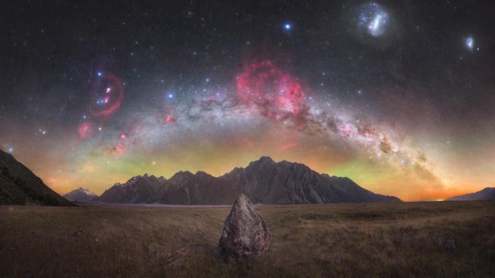 The Milky Way and Gum Nebula lighting up the sky over Tasman Valley in New Zealand