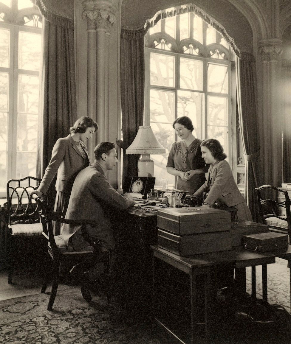  The Royal Family, in 1943, pictured around King George VI's desk