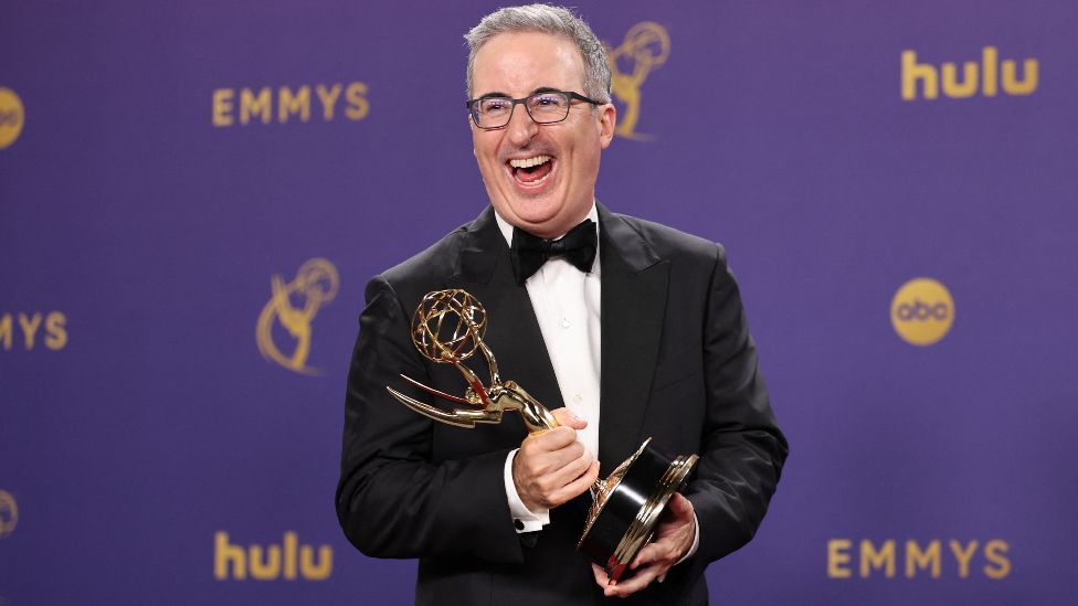 John Oliver poses with the Outstanding Scripted Variety Series award for "Last Week Tonight with John Oliver" at the 76th Primetime Emmy Awards in Los Angeles, California, U.S., September 15, 2024