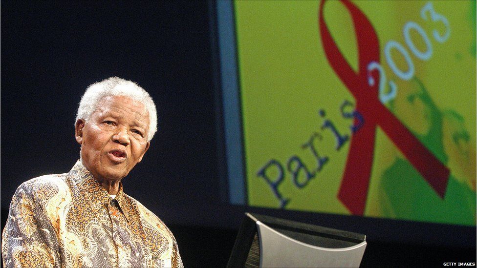 Mandela gives a speech 14 July 2003 in Paris during the second day of an AIDS four-day conference.