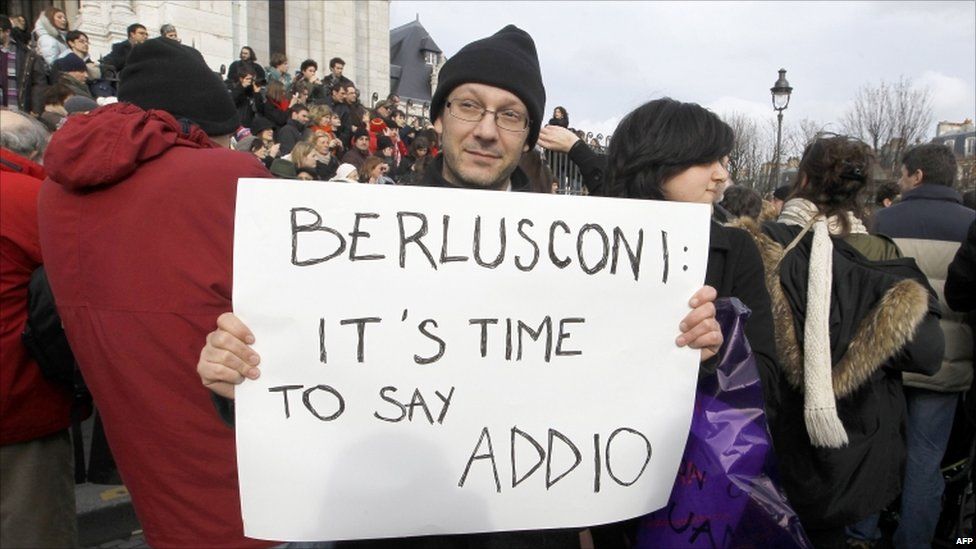 A man in front of the Sacre Coeur basilica in Paris at an anti-Berlusconi rally on 13 February 2011
