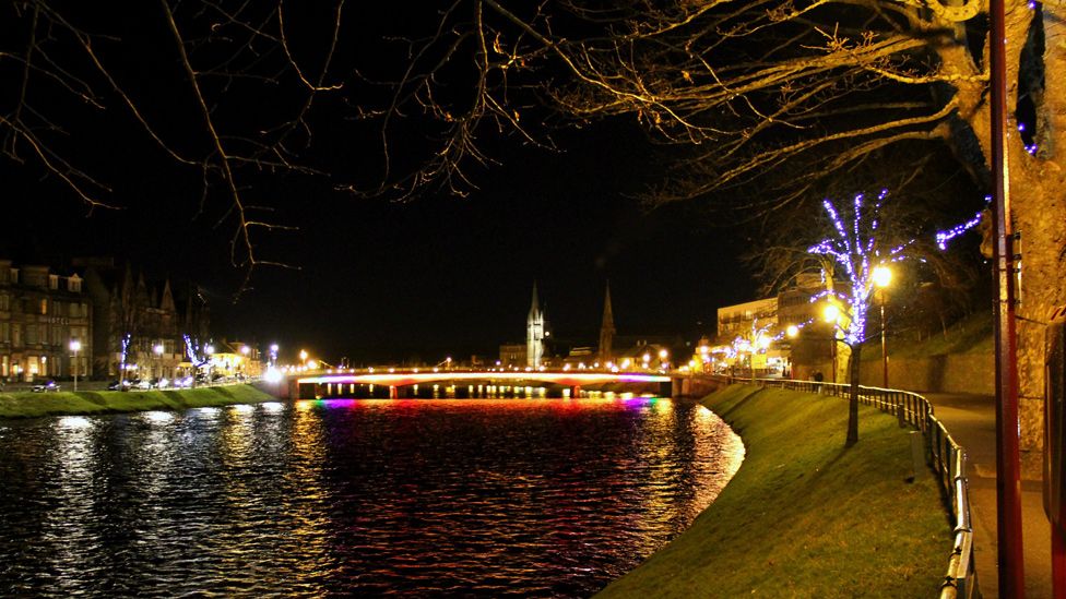 Inverness lit up at night
