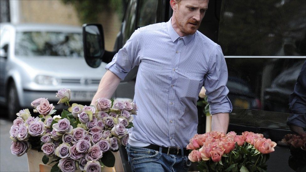 Flowers are delivered to the north London home of former Beatle Paul McCartney on 8 October, 2011