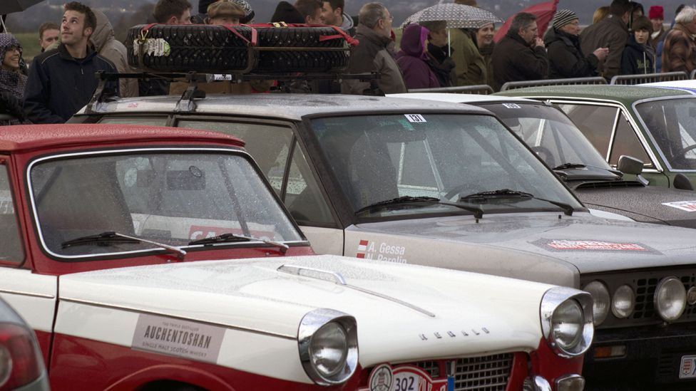 Spectators view cars at the start of the Monte Carlo Rally