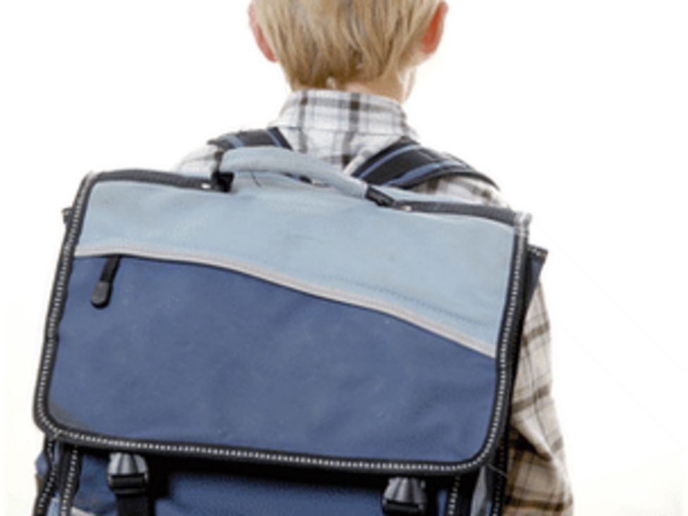 School bags 'causing back pain' BBC News