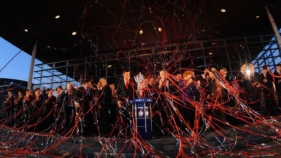 The Wales team were showered with ticker tape after the re-presentation of the Six Nations trophy.