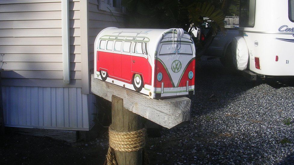 A postbox in the shape of a VW camper van