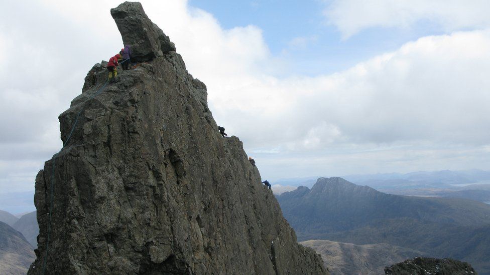 People climbing The Inaccessible Pinnacle of Sgurr Dearg