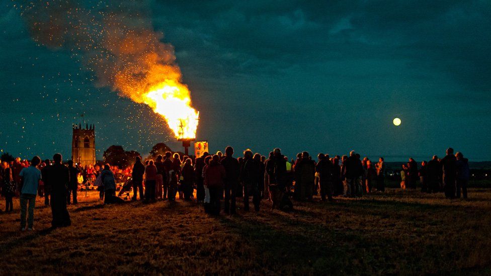 Villagers gathering for the lighting of the Jubilee beacon