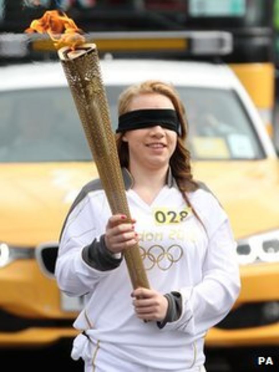 Olympic Torch Pc David Rathbands Daughter Carries Flame Blindfolded 