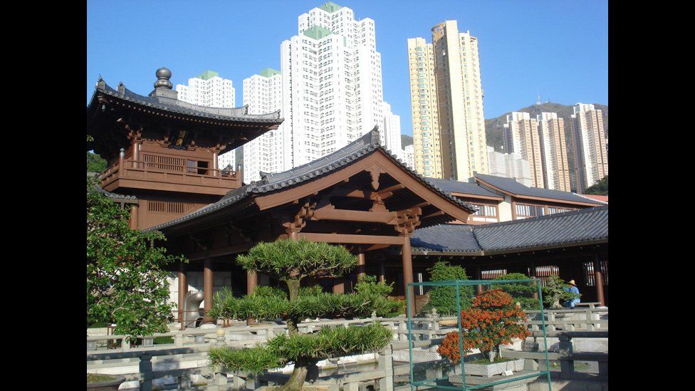 The Chi Lin Nunnery with the Hong Kong skyline in the background