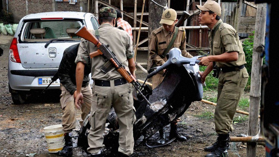 Policemen at the site of the blast in Imphal