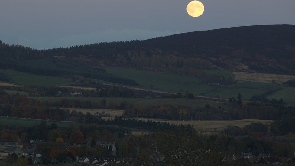 Full moon over Learney Hill and the village of Torphins