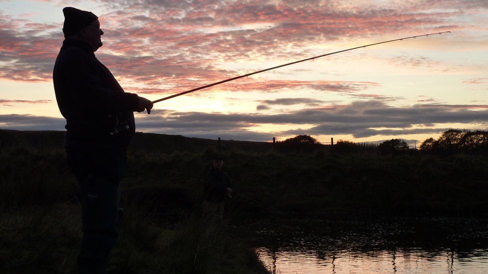 Fisherman at dusk