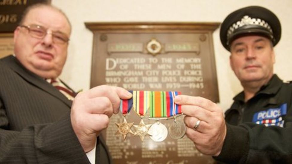 Police officer presents four medals to war hero's son - BBC News